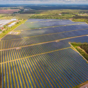 solar-power-plant-field-aerial-view-solar-panels-(1)